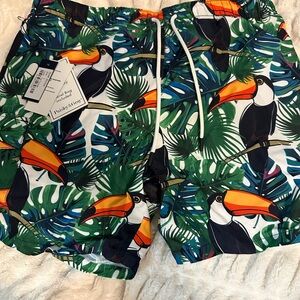 Paisley & Gray tropical print swim trunks